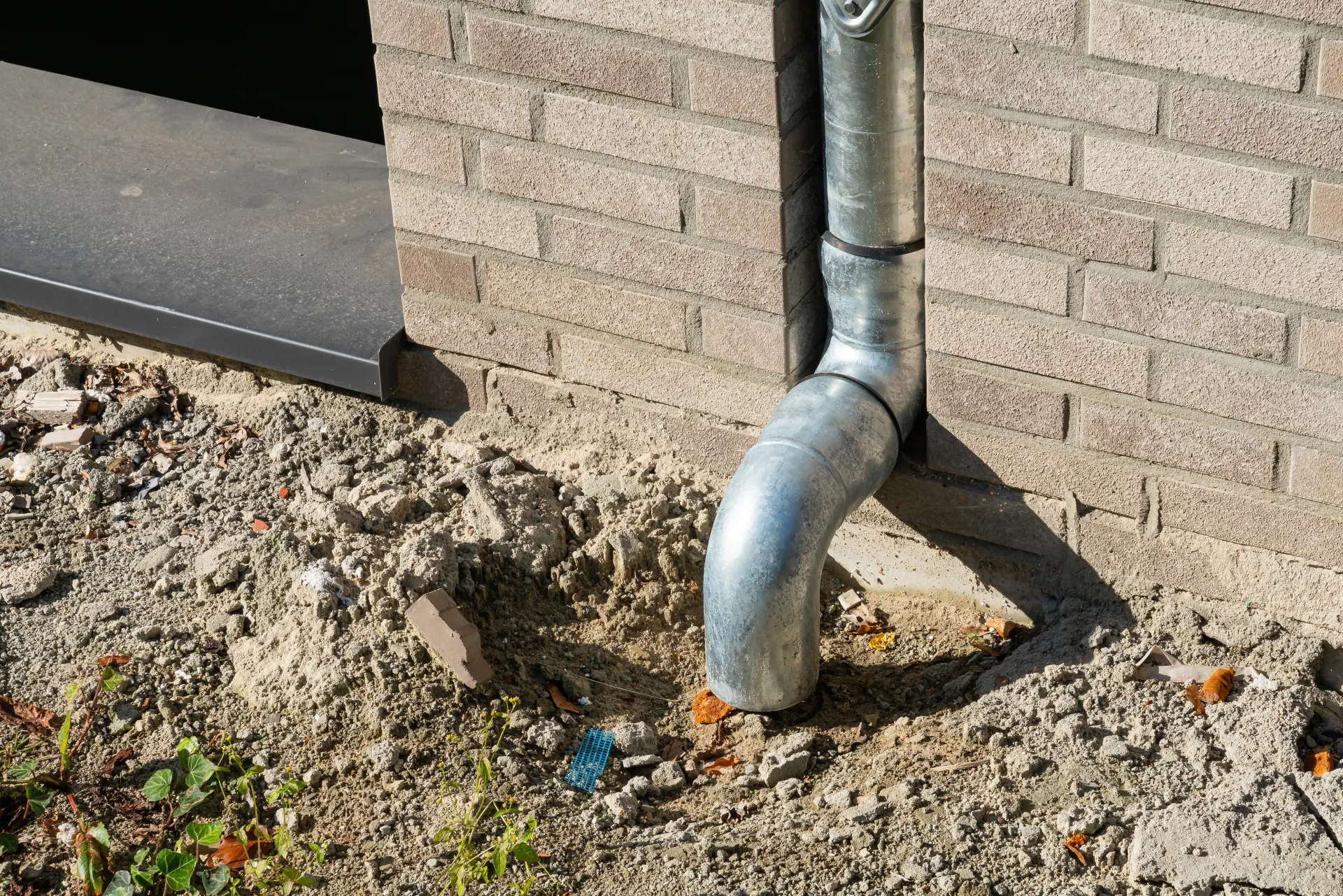 Drainage pipe directing water away from a property to prevent overflow issues